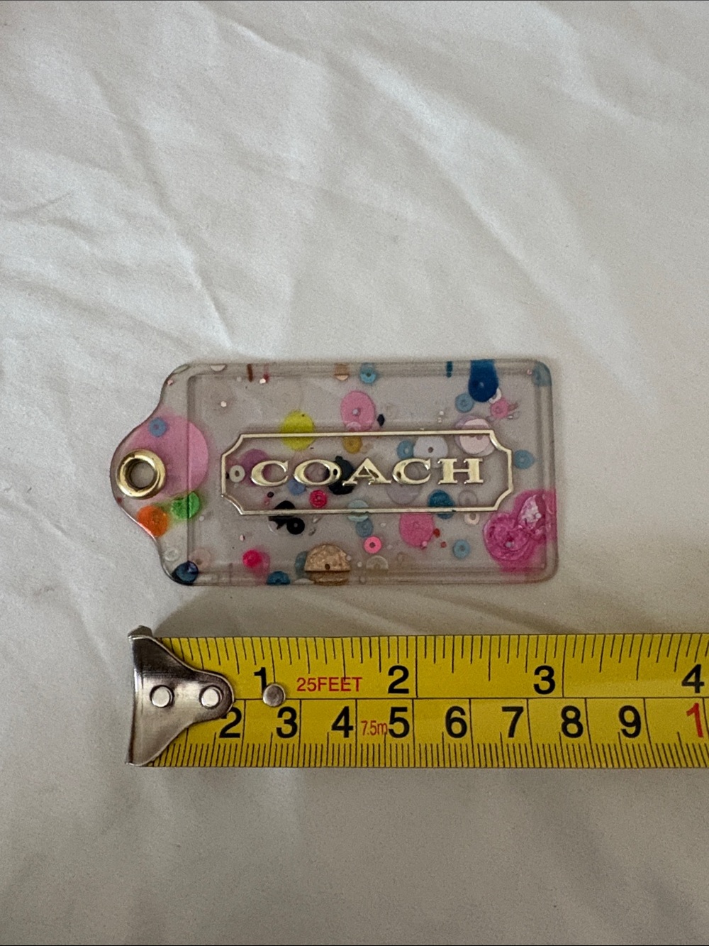 Coach Clear Confetti Hang Tag with Gold Logo - Picture 3 of 3